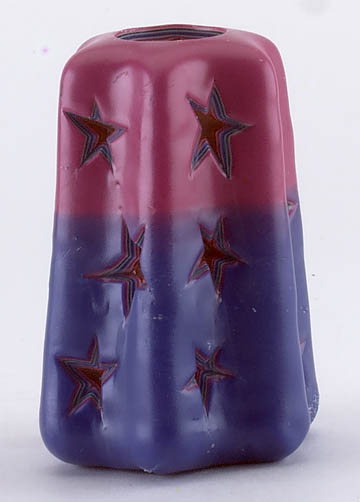 stars cut out candle
